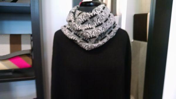 Beautiful poncho with an attached cowl neck. It was available in a number of colors.