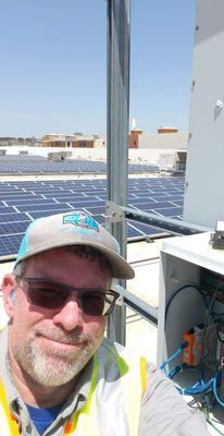 Jason Shaw on commercial roof solar PV performing O&M.