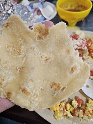 Not fully cooked flour tortilla