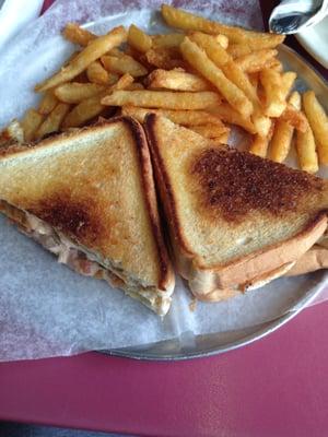 grilled chicken sandwich and french fries.