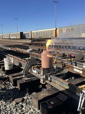 Ongoing thermite welding inspection activities as part of the rail system expansion project. Ensuring precision, safety, and quality