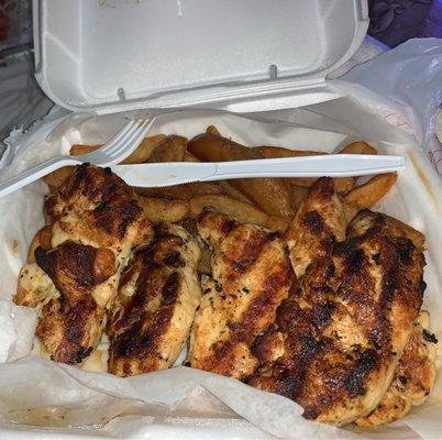 2 Pc Grilled Chicken Dinner and fries I always ask to get mine cooked longer that's why it's darker great food always
