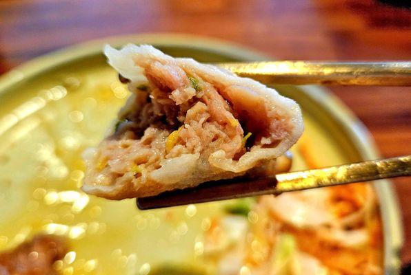 Half of a pork pot sticker