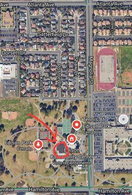 The parking lot close to the pickleball courts is accessible from Magnolia St.