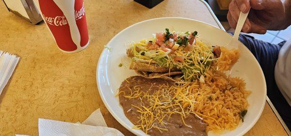 3 rolled tacos rice and beans