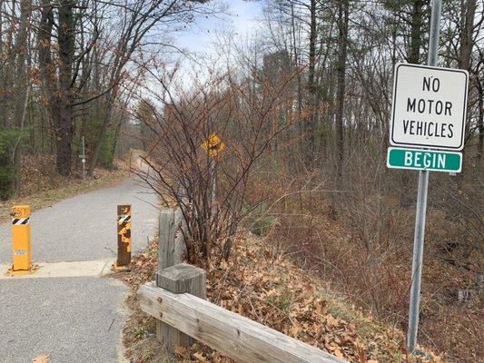 Park down the road at the school