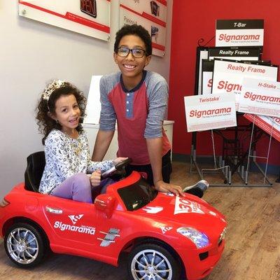 The kids had a pretty unbelievable amount of fun with this car while we were looking at signs.