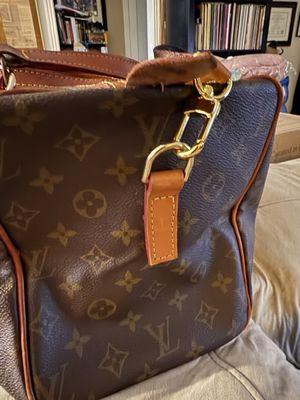 The added d-ring with my non-oem strap