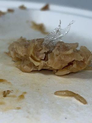 Was eating a pot sticker , when felt a weird texture. A large piece of plastic shoved inside it. Absolutely gross!