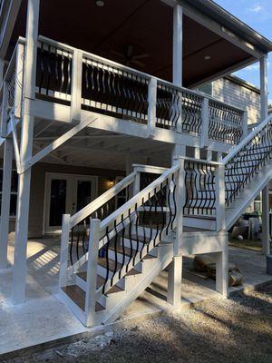 Deck with multi level stairs.