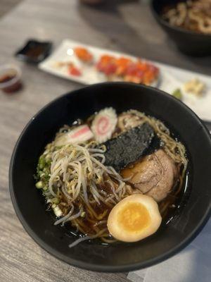Shoyu ramen with wavy noodles, pork belly, fish cake, scallions and bean sprouts. Sooo good!!