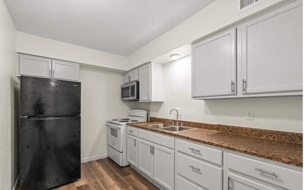 Kitchen Area Refrigerator, Stove/Oven and Microwave included