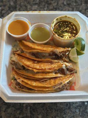 3 Quesa Birrias Plate - 3 corn tortillas stuffed full of tender beef barbacoa, cheese, and cilantro and onions