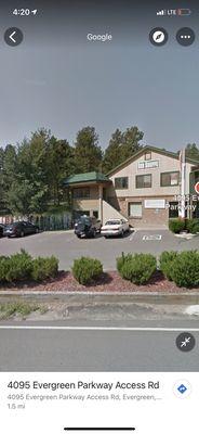 haircut co. upstairs, end of building..