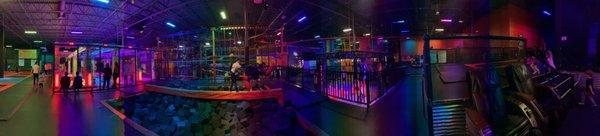 This shows main trampoline area, ball pit, jousting, Virtual gaming and lounge chairs for adults.