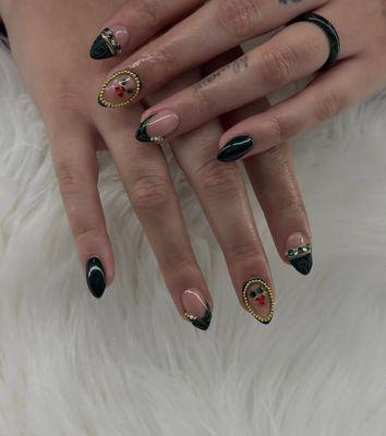 Dark green Xmas nails, with gems & 3D lines, along with 3D sweater look.