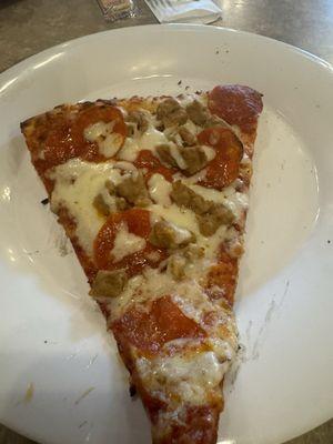 Pepperoni and sausage slice