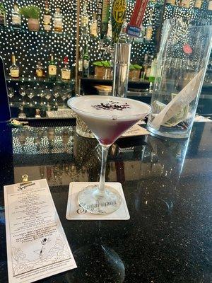 Some sort of valentine themed cocktail, chocolatey and nice, would've liked a better stir of the ingredients