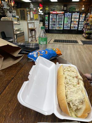 Chicken salad sub. Fridges with lots of drink choices.