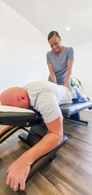 Dr. Raith assessing the low back and pelvis