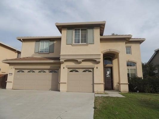 Spacious newer home built in 2006 with 5 bedrooms, 3 full bathrooms, over 3,100 square feet of living space, upper-floor laun...