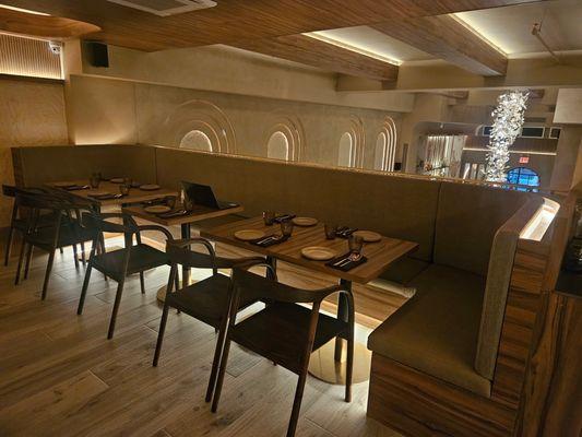 The photos showcase custom-built commercial sofa seating manufactured for restaurant clients.