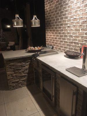 Outdoor kitchen on lake house patio