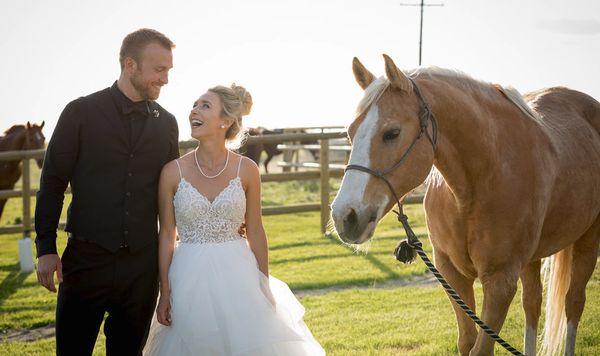 Horses make a great backdrop for a wedding in Zillah Washington!