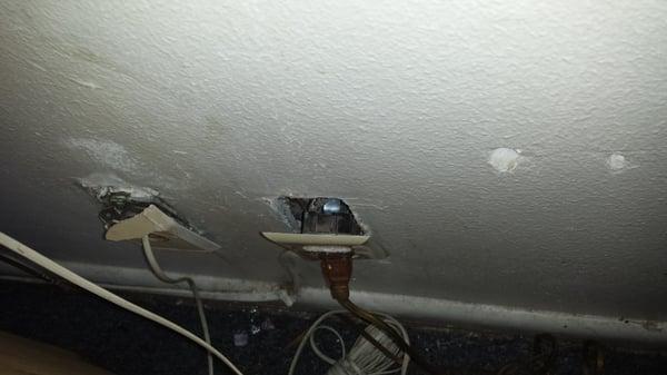 Only socket where I could plug my phone in. Trash was from previous occupants.