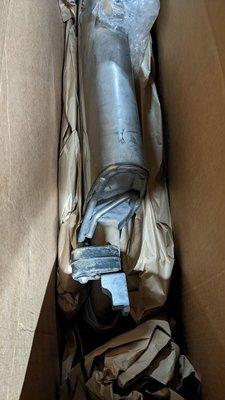 My muffler! Don't worry, I took A LOT of paper out. Very well packed!