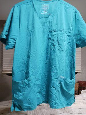 In exactly which universe is this an acceptable condition to return a customer's scrubs in? 9 sets ruined.