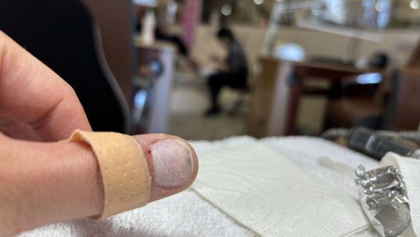 After she was purposely pilling off my skin on my thumb because i showed mistakes in her work . Nope , i was not moving an inch