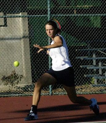 Nicole Havlicek hitting a tennis forehand