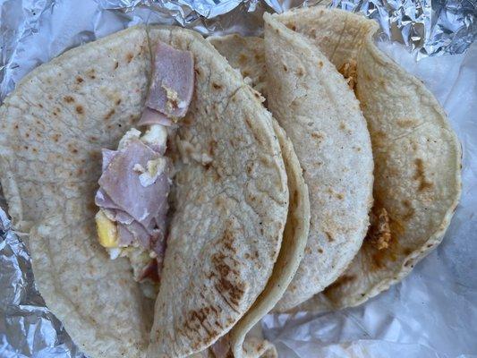 "Tacos de hue is con Jamon"  Service was horrible. Servicio horrible, mesera grocera y Los tacos peor...