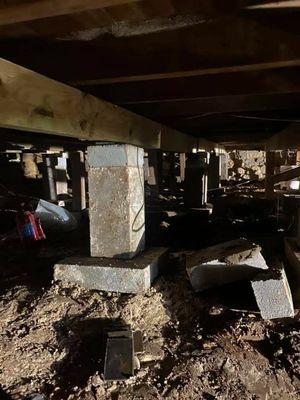 Foundation repair with concrete blocks and concrete form.