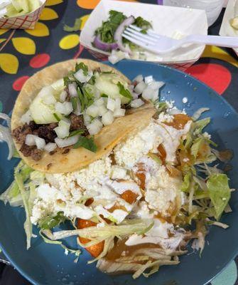 Asada taco and chicken enchilada, add your own toppings for tacos.