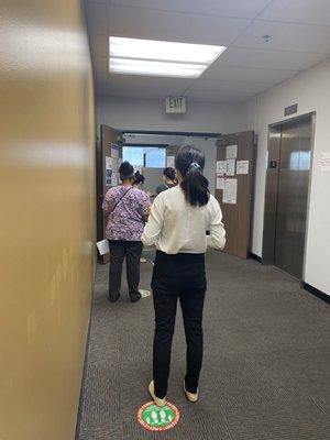 Line to come in and get Frisk by the security guard.