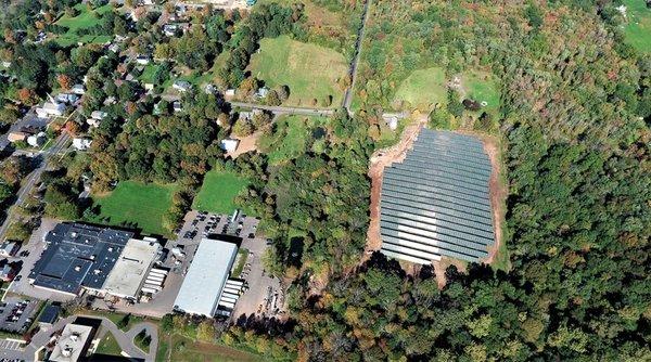 This solar installation completed by Smart Roofs Solar creates 100% of this CT manufacturer's electric usage. 