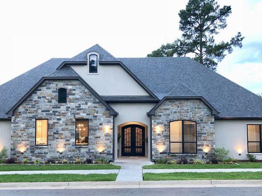 Beautifully customized stucco and stone home by Christian Builders. There was not a detail missed from the custom 8' double i...