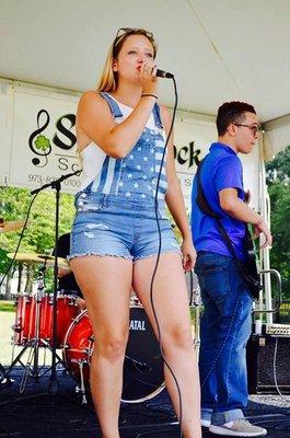 Our rock band program features weekly rehearsals and performances at major events like the Pequannock Hoedown.