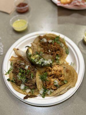 Chorizo taco, chicken taco, deshebrada taco