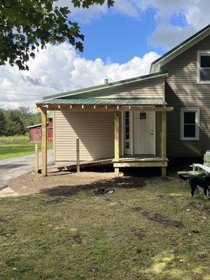Covered porch with ramp (unfinished)