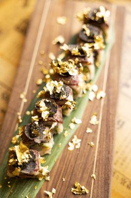 GOLD DIGGER SUSHI ROLL w/cold water lobster, bluefin tuna, A5 wagyu, foie gras,asparagus, caviar, fresh black truffle, gold flake