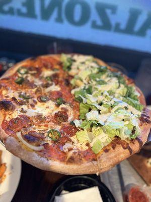 Half Baciagaloop Pie and Caesar Salad pizza