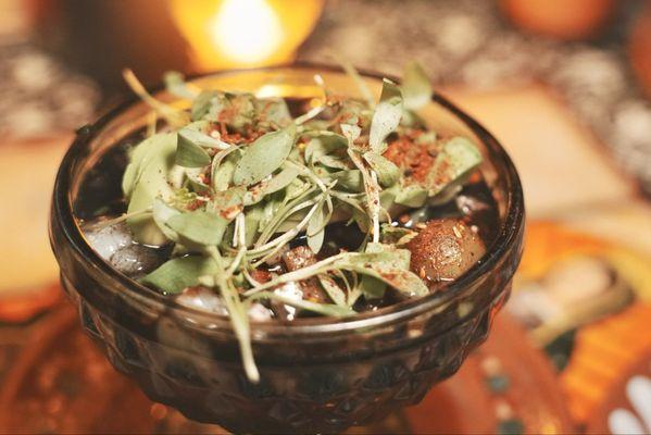 Bay Scallop Black Cocktail. Tender octopus, creamy avocado, and a hint of sweet heat from the sauce.