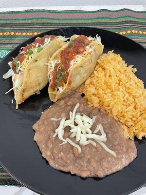 2 Beef tacos w/ rice & beans