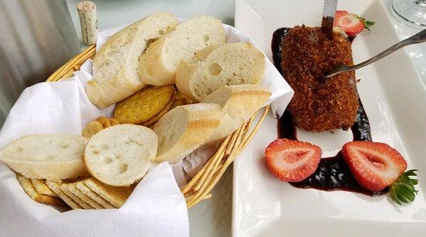 All the bread and crackers that come with the baked cheese appetizer.