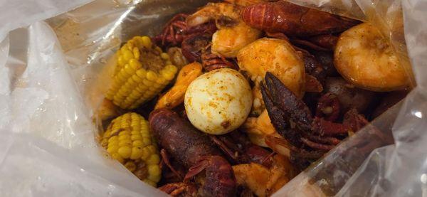 BOGO headless shrimp with crawfish, 2 eggs, potatoes and corn