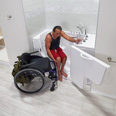 Ella's Transfer Tub: seamless side transfer from wheelchair, secure grab bars, quick-drain design, plus optional massage and heat.