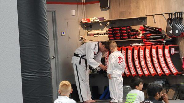 My son earning his next stripe